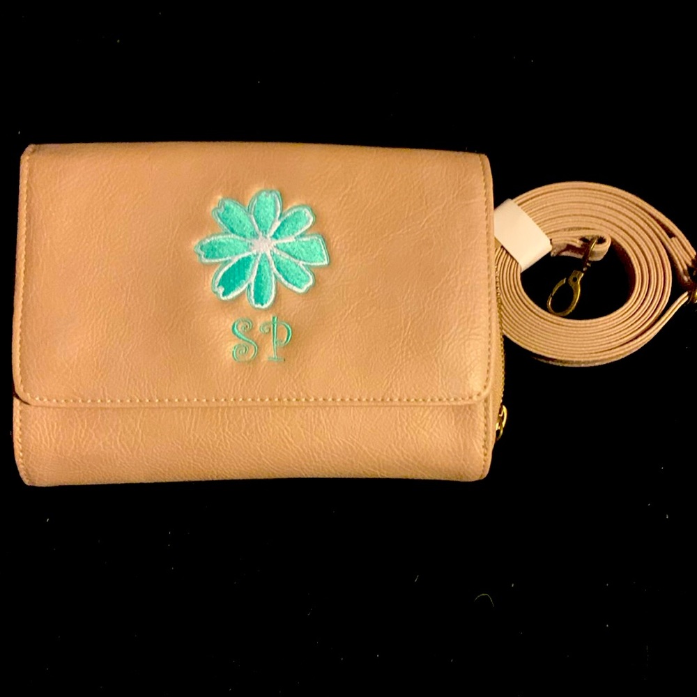 Thirty One bag brand new with letters “SP” embroidered on it. Never used